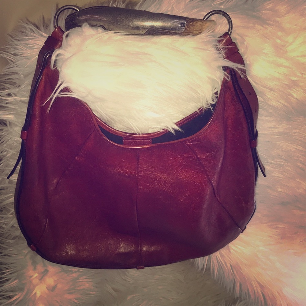 Yves Saint Laurent Hobo Tusk Handbag.